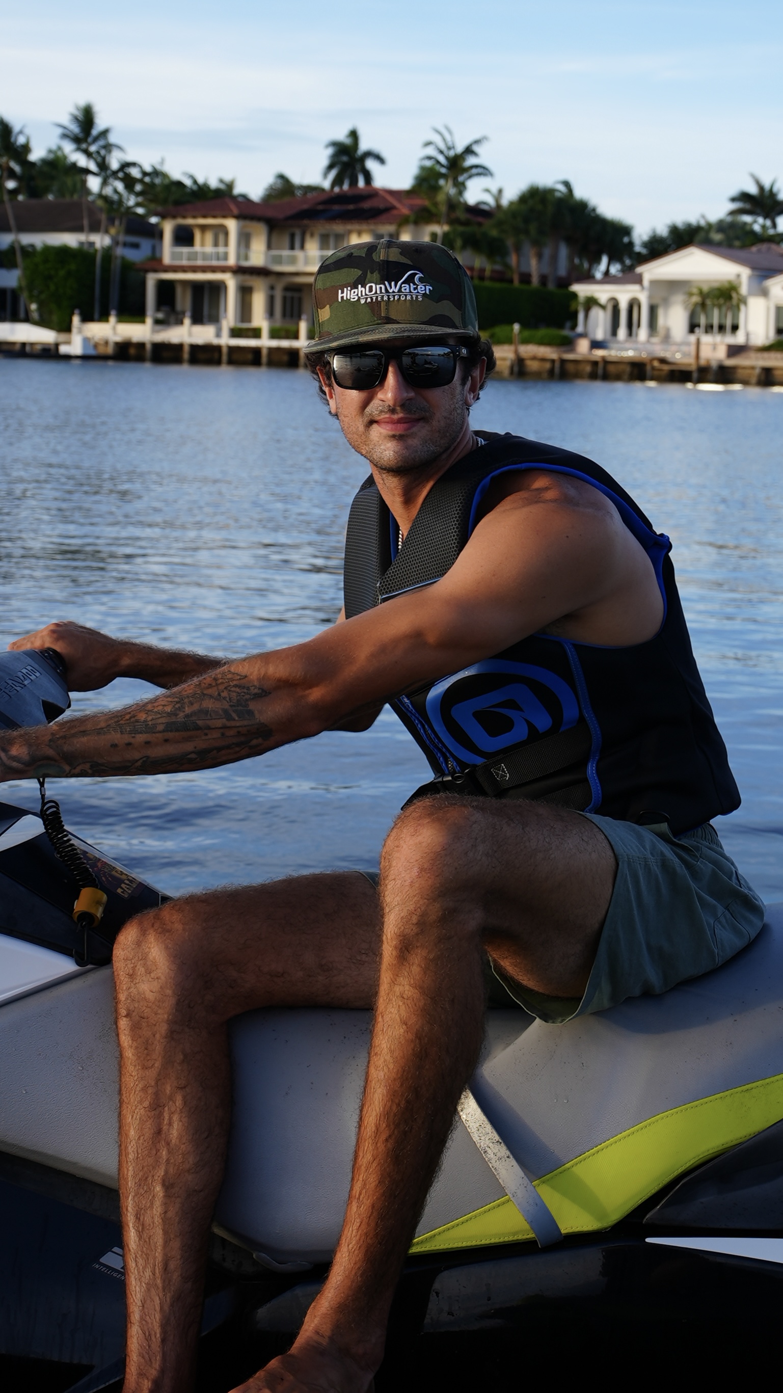 Jason on the water wearing a High On Water Sports cap